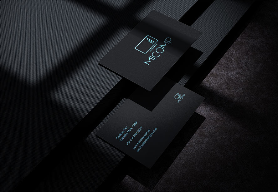 MiComp Business Card – A modern and professional black-themed design displayed on a dark background, reinforcing credibility.