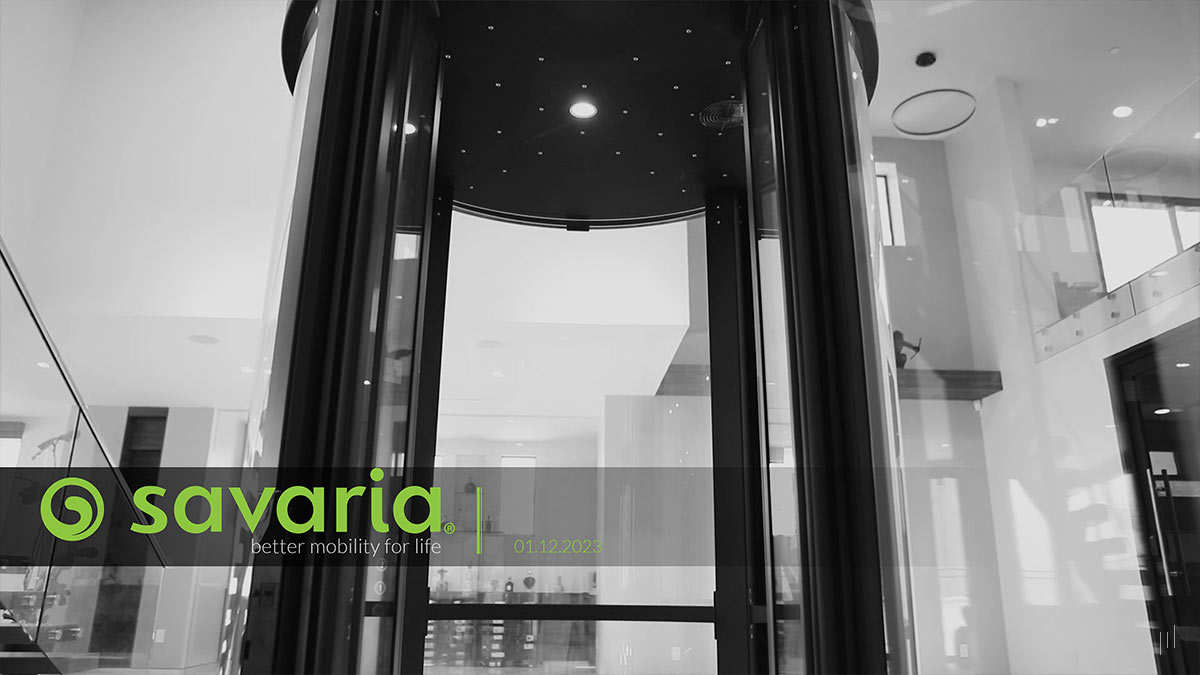 Savaria Company Profile – Title slide featuring the presentation name over a background image of an elegant luxury interior with an elevator, symbolizing accessibility and innovation.
